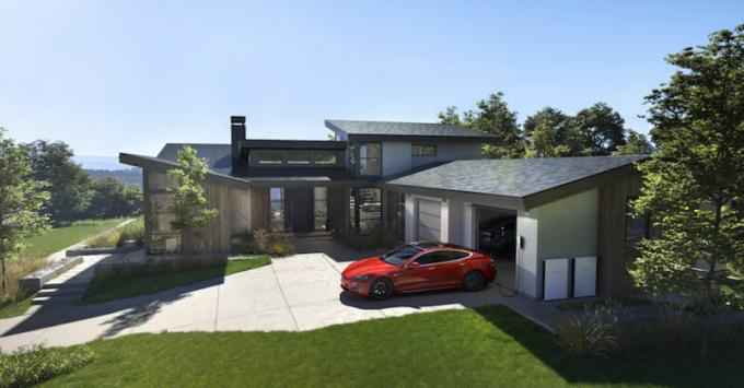 Luksuzna kuća u predgrađu ima Teslu na prilazu i solarne ploče na krovu.